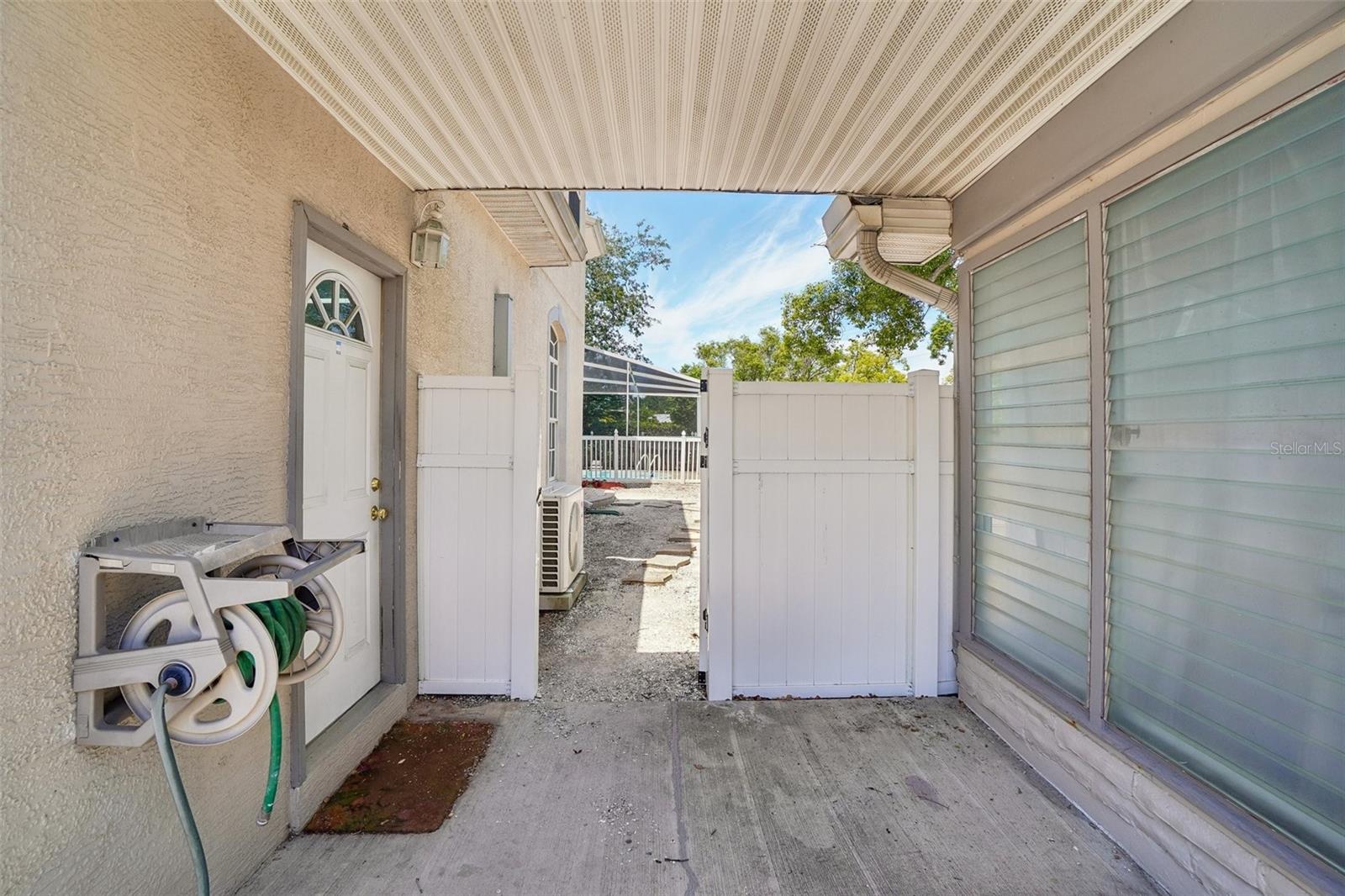 Breezeway between Primary Home Garage Entrance and Guest House Entrance