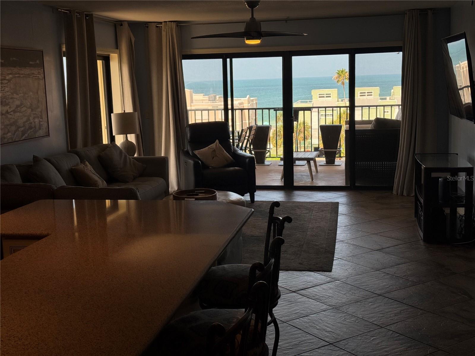VIEW FROM BACK AREA NEAR KITCHEN AND KITCHEN ISLAND