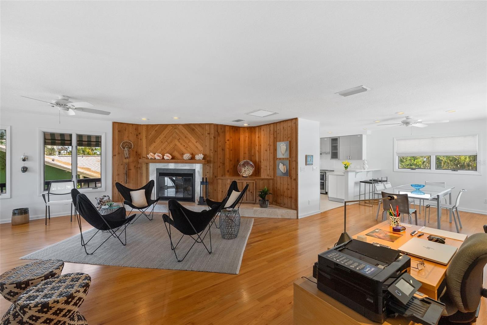 Living Room with Wood Burning Fireplace and beautiful Hardwood Floors