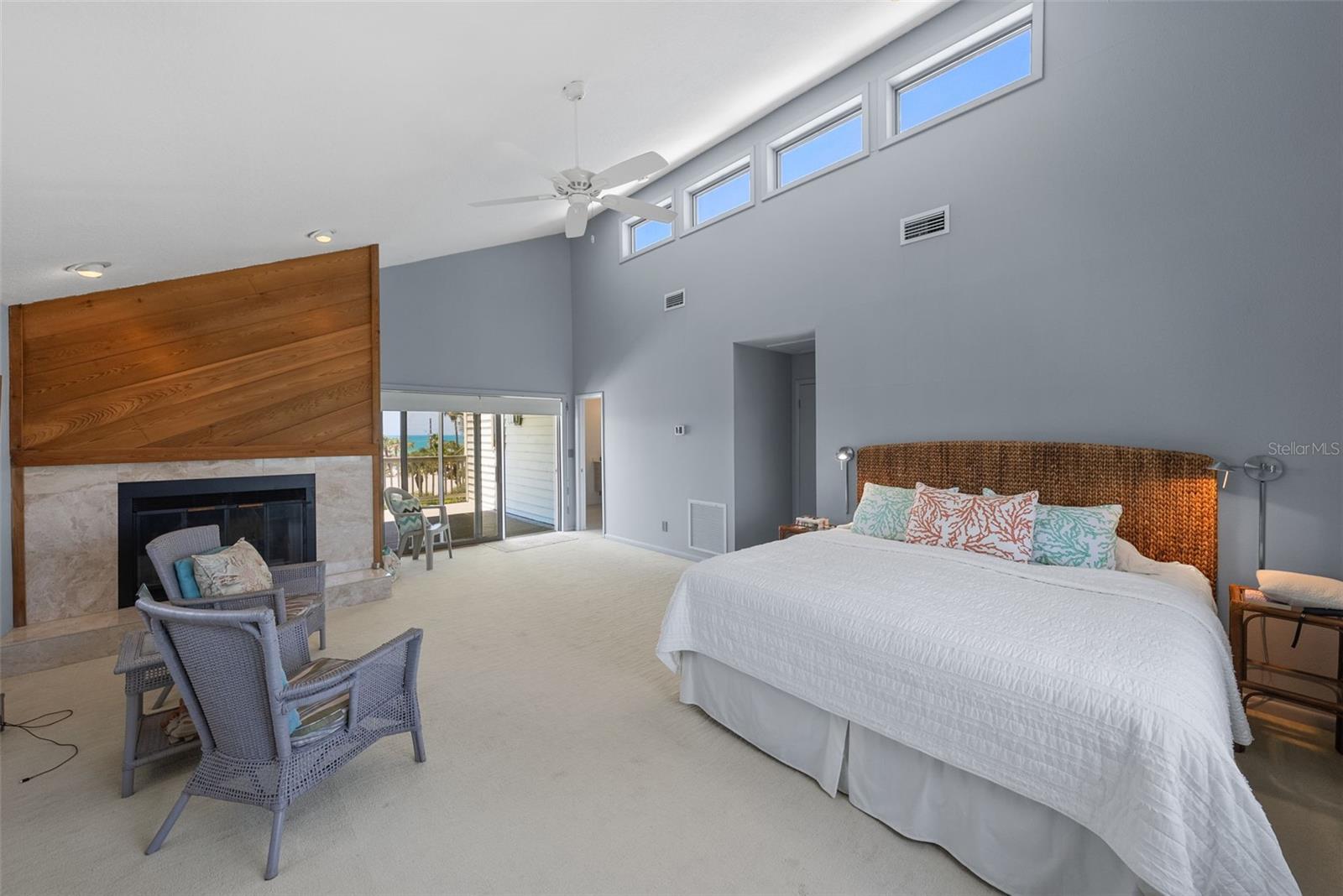 Wood Burning Fireplace and Sliding doors to the West Facing Deck