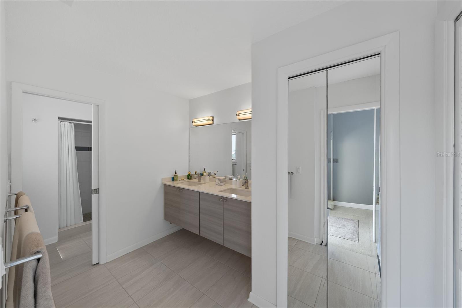 Primary Bath with Double Vanity and Linen Closet
