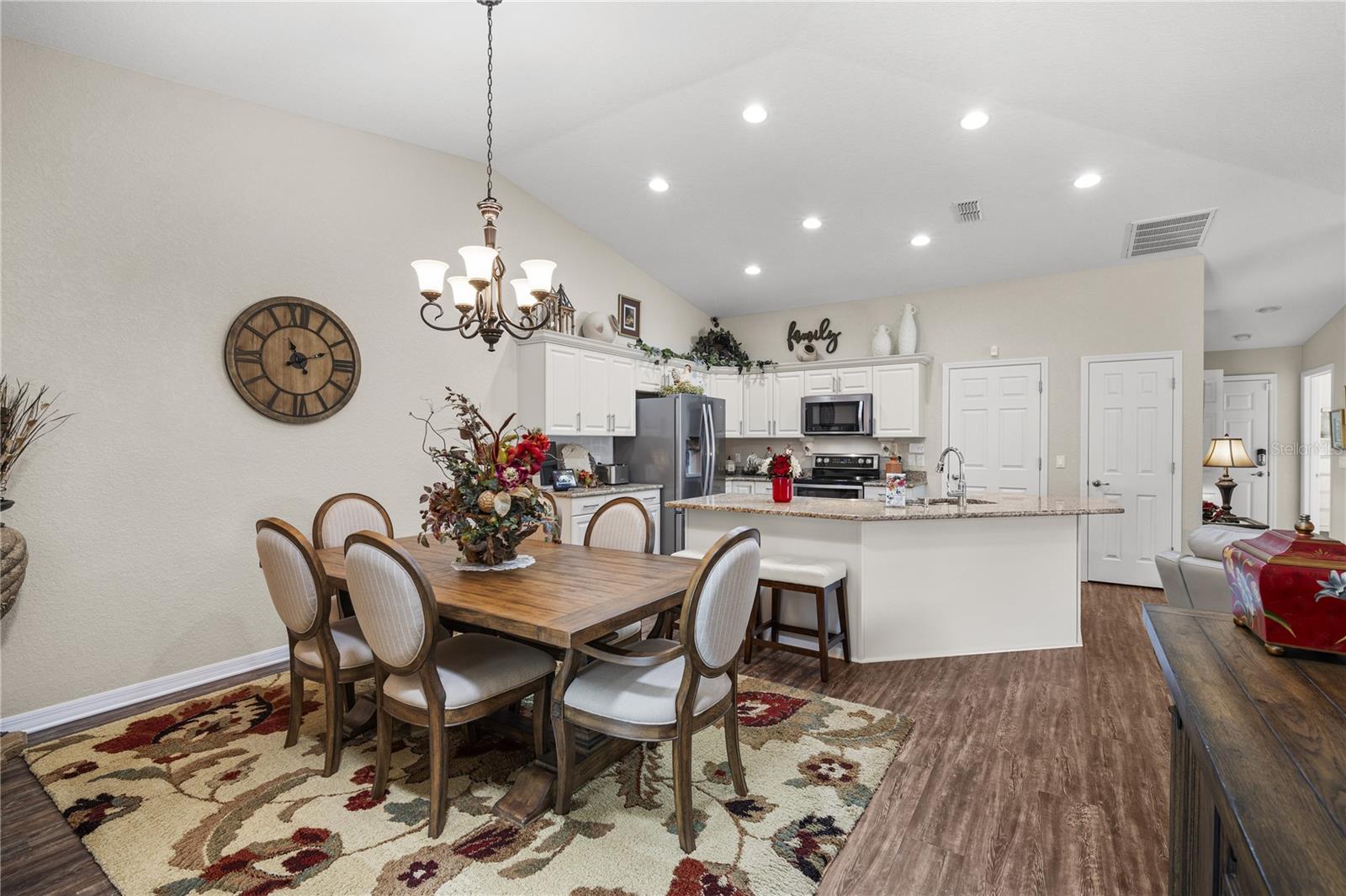 Light, Bright and OPEN Kitchen and dining area with cathedral ceilings