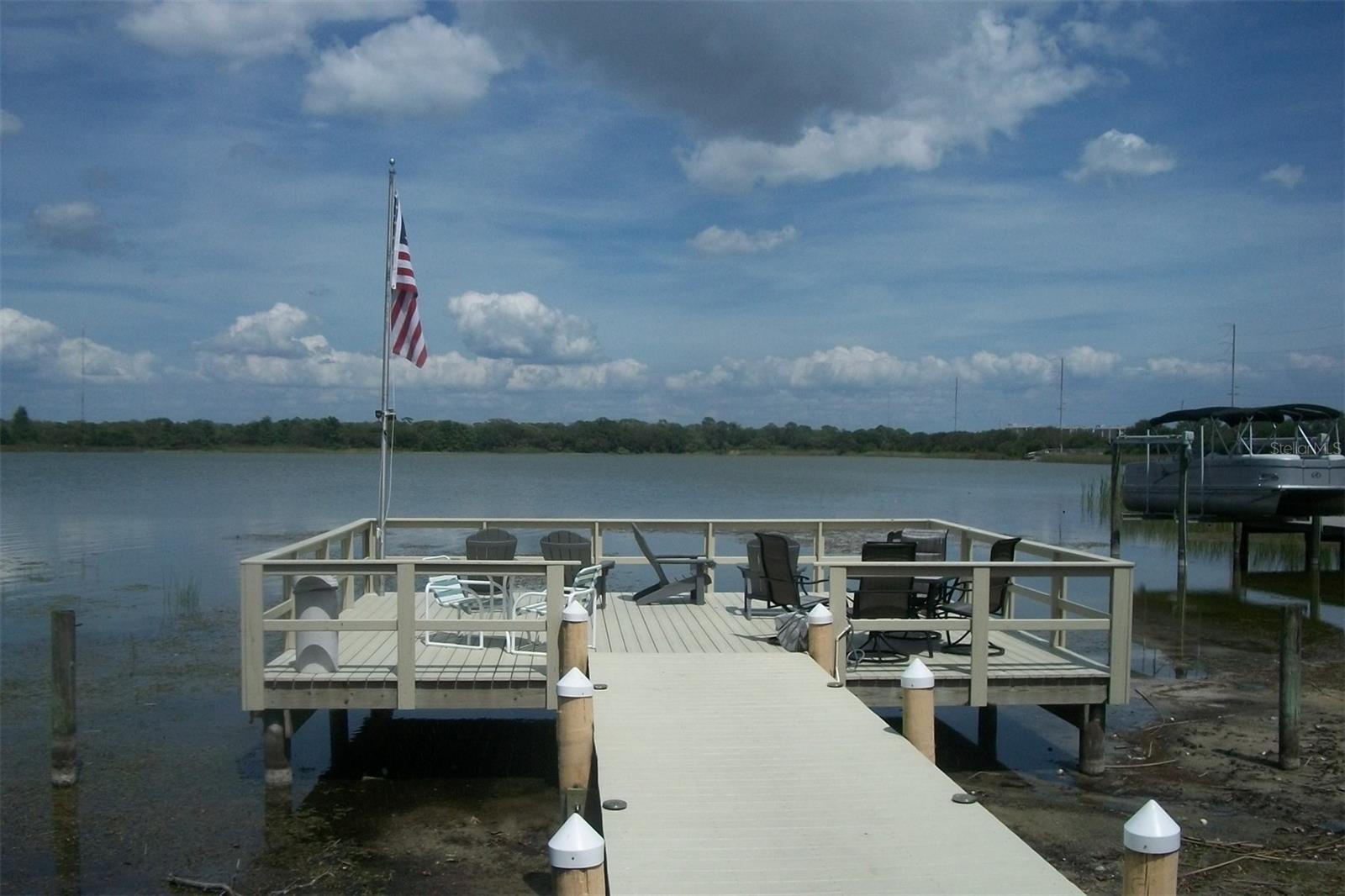 Community Dock overlooking Lake Seminole, across the Lake is Lake Seminole Park with walking trail, play ground, picnic shelters, boat ramps