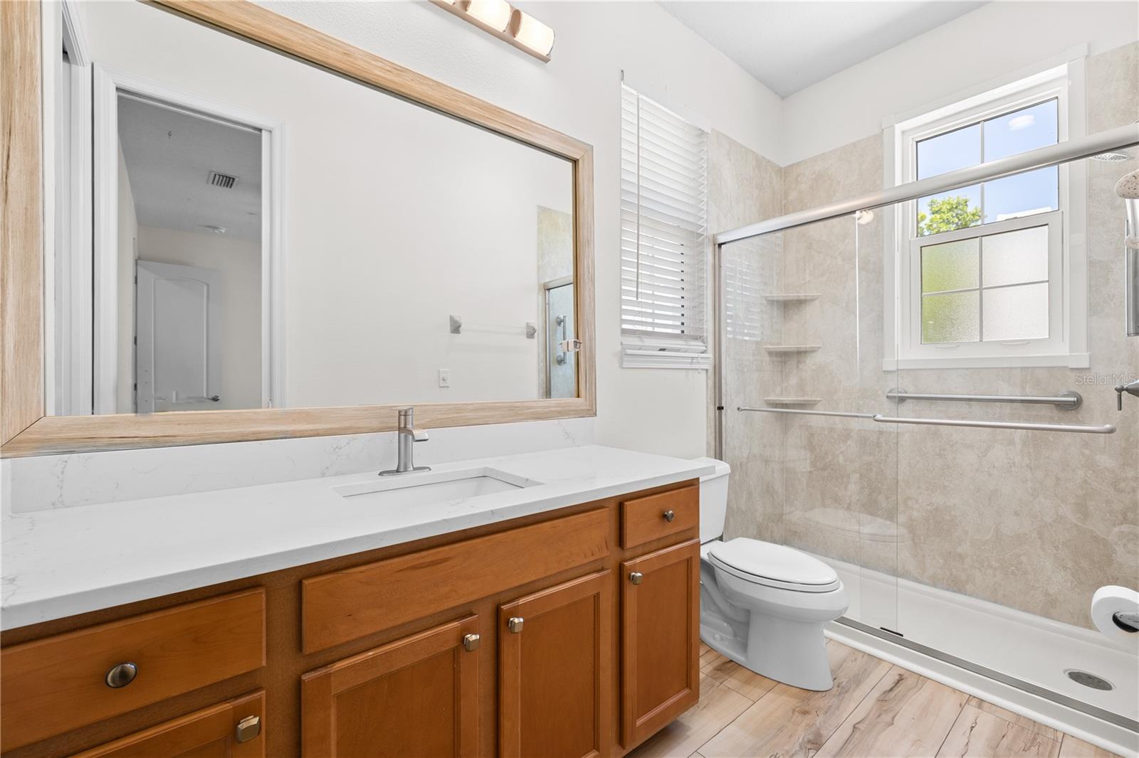 Jack and Jill bathroom between 2nd and 3rd  bedrooms.