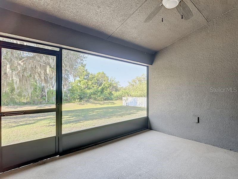 njoy tranquil views from the screened in back porch which opens to the spacious backyard. Perfect for relaxing outdoors!!!