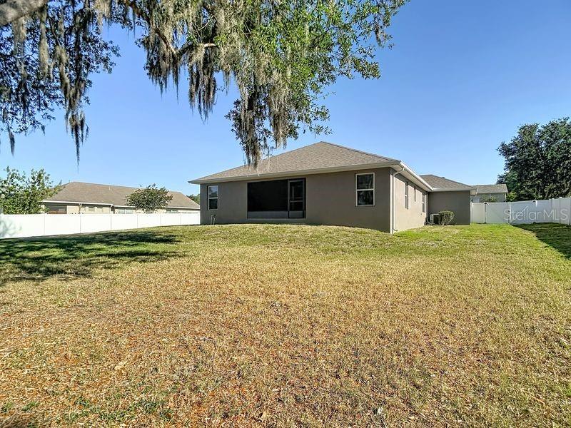 Expansive backyard offering plenty of space for outdoor activities, gardening, or whatever your heart desires!!!!