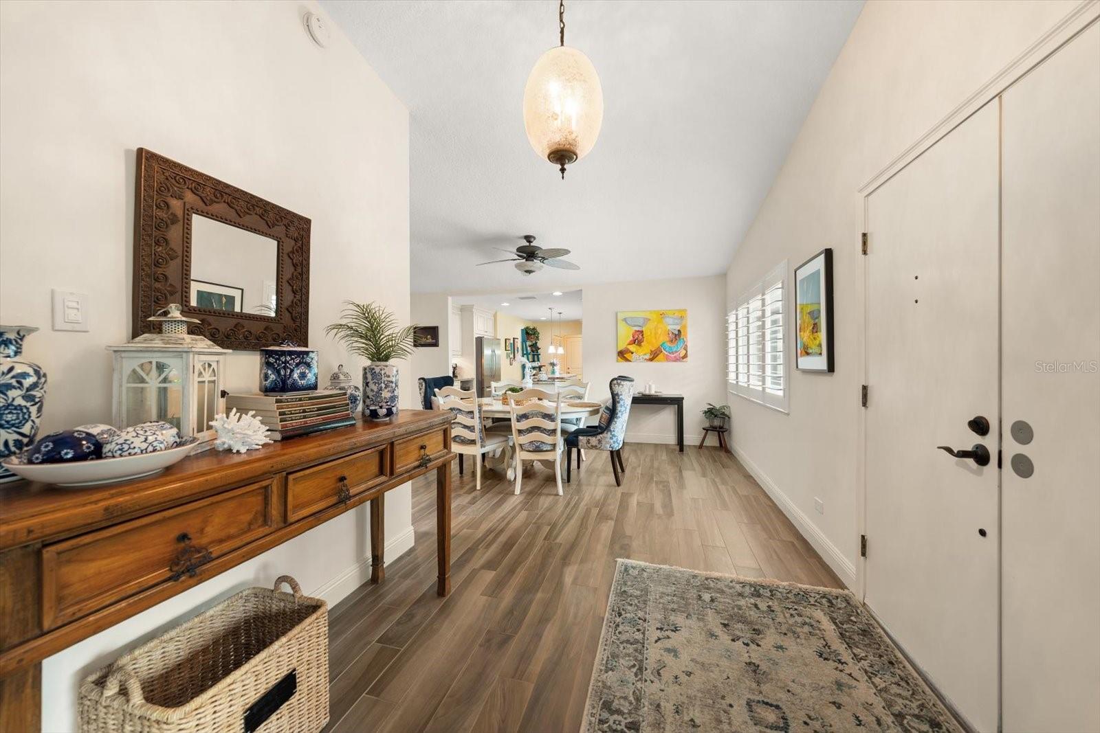 Foyer area with high ceilings create an open and airy vibe.