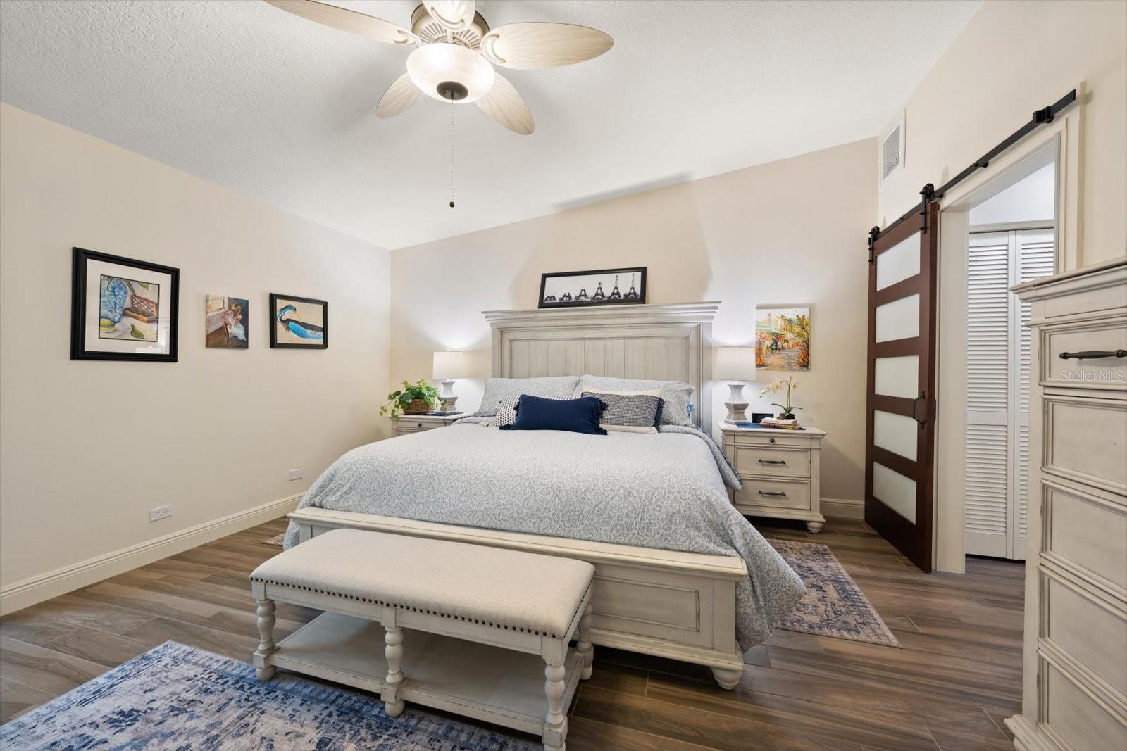 Primary suite complemented by vaulted ceilings