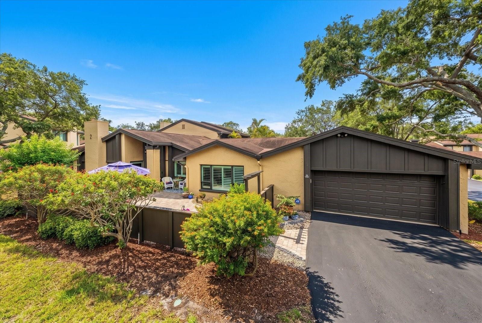 Oversized two car garage, inside large laundry room, brick paved courtyard all on one level, this property is certain to check many boxes..