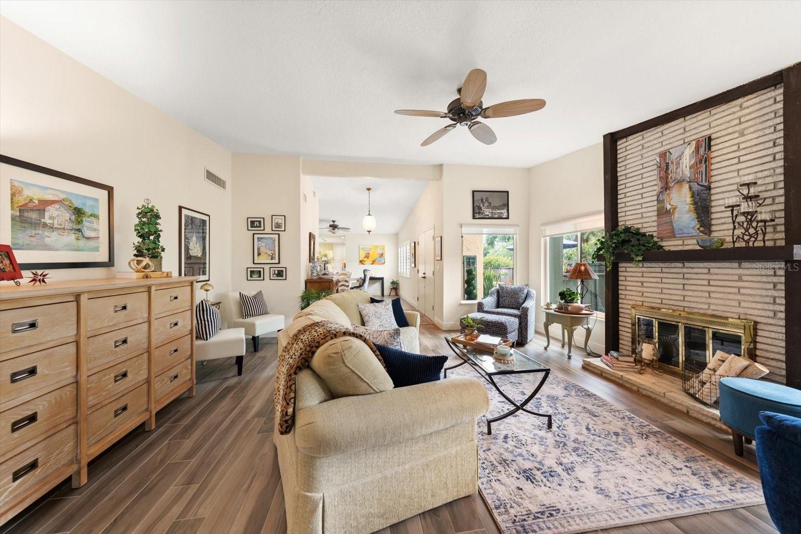 Living room area with welcoming fireplace for those rare but chilly evenings.