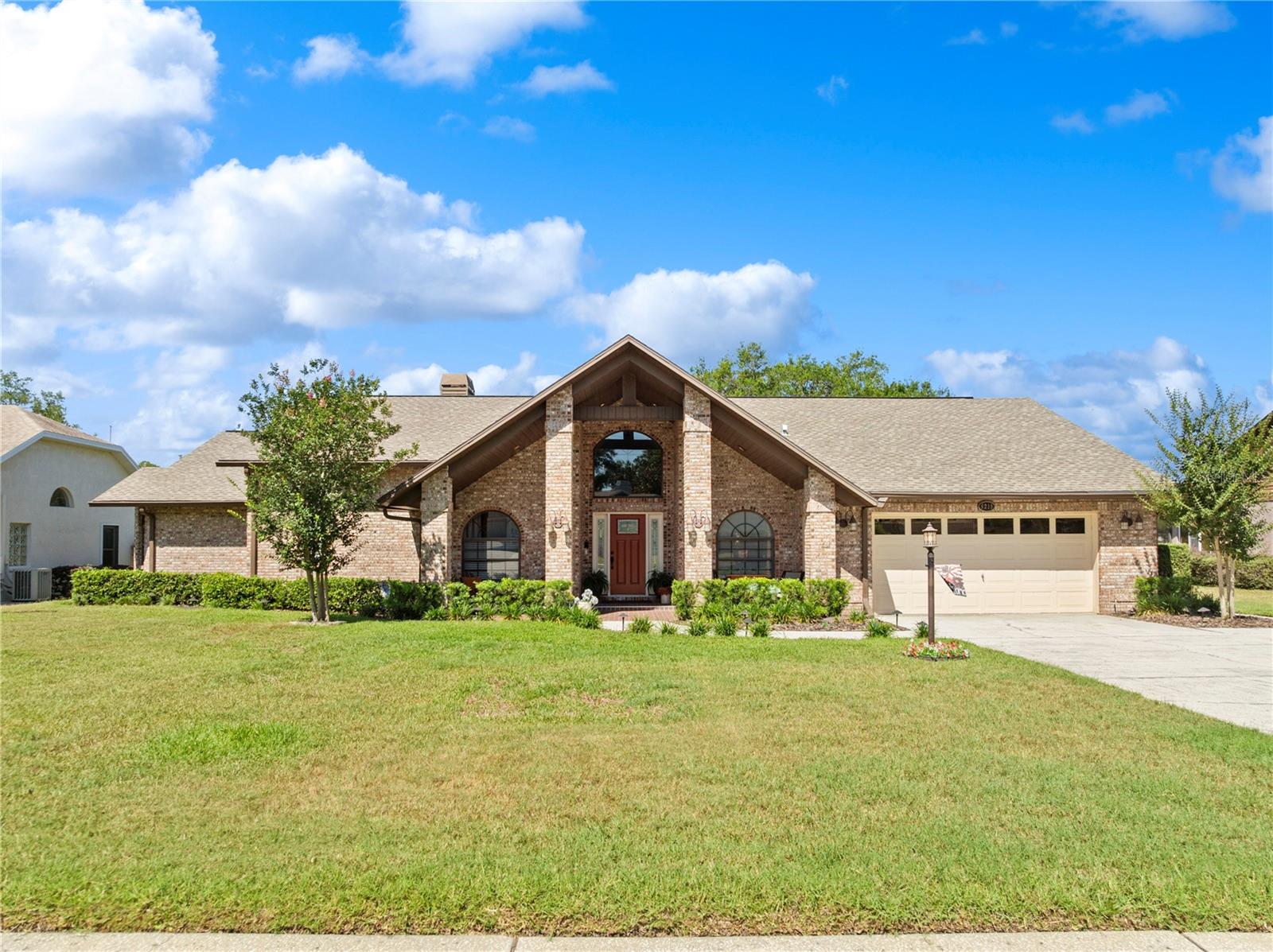 Impressive elevation with extended driveway.