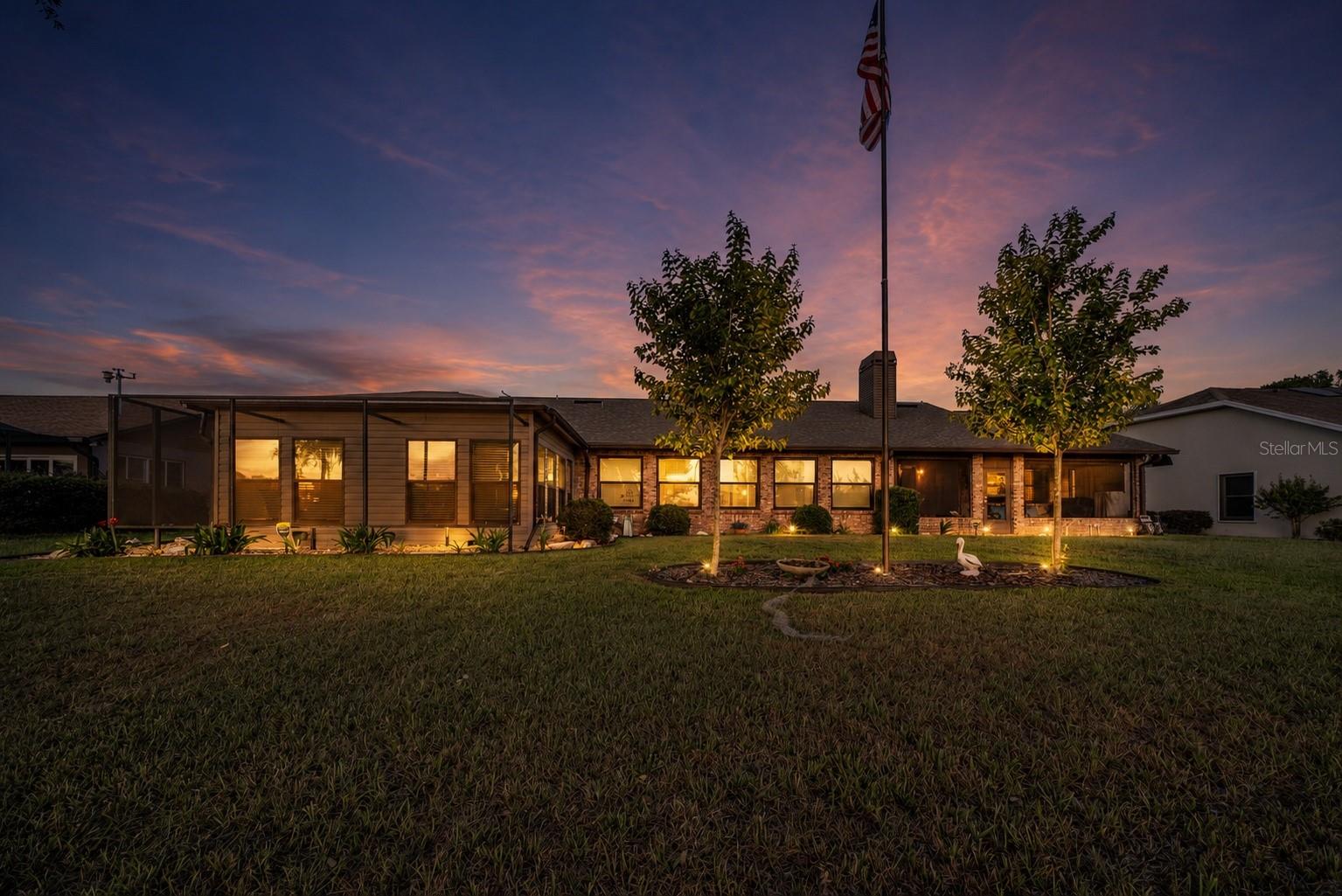 Extensive landscape lighting around whole house