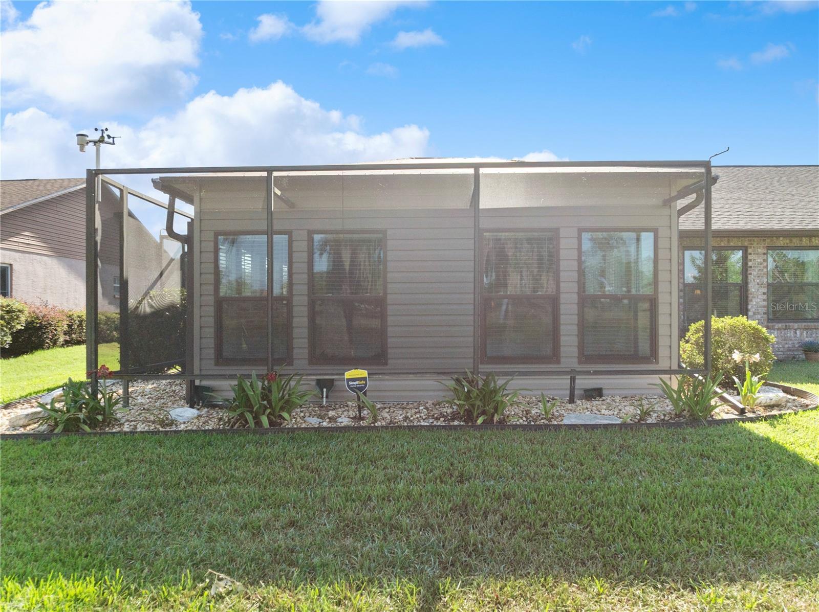 Golf ball screen on sunroom windows