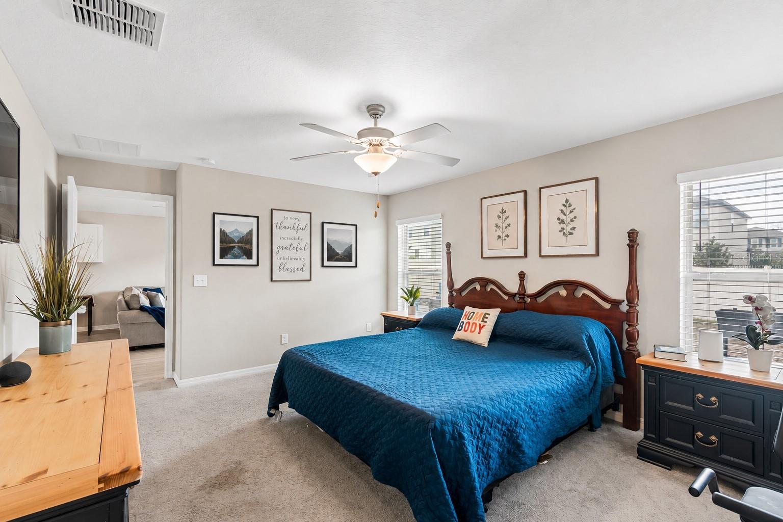 Virtually staged bedroom (wall decor)