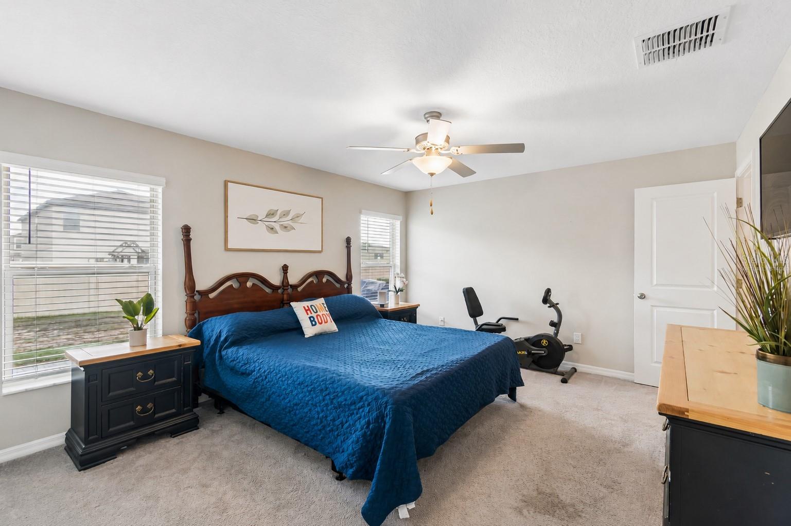 Virtually staged bedroom (wall decor)