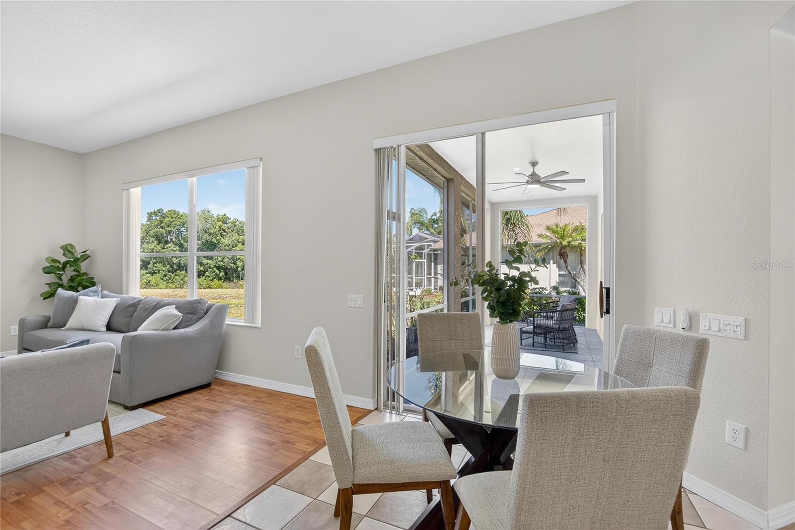 The family room and noon open to the screened back porch