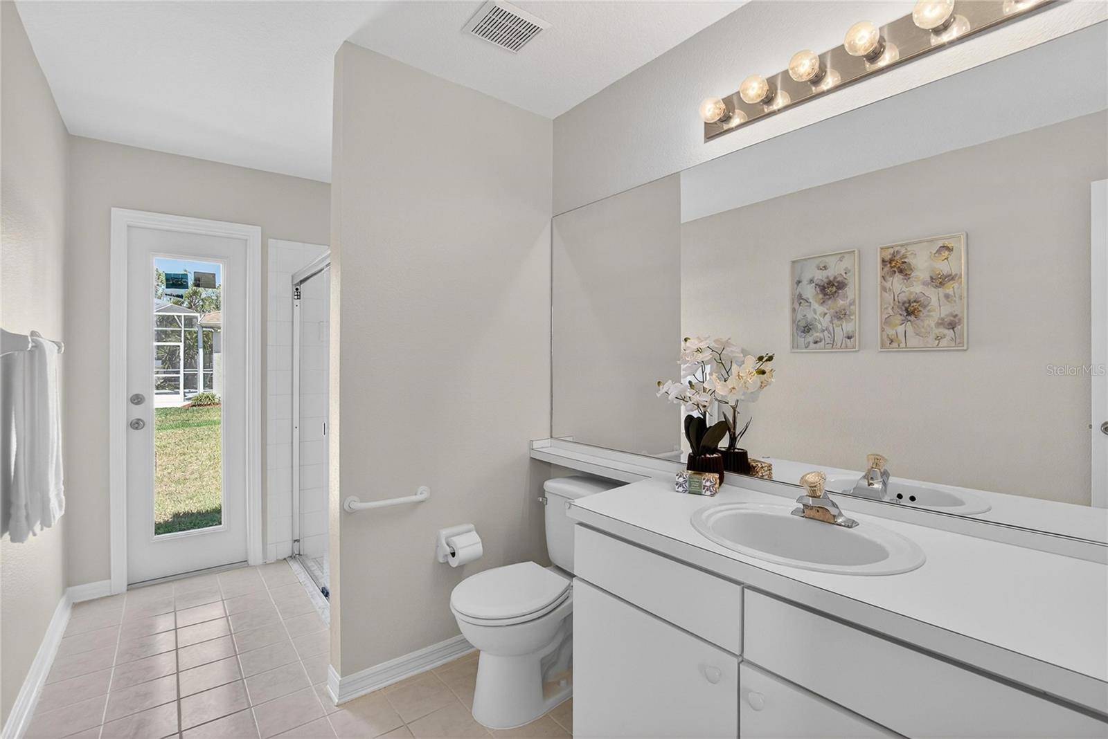 The "pool" shower bathroom with outdoor access