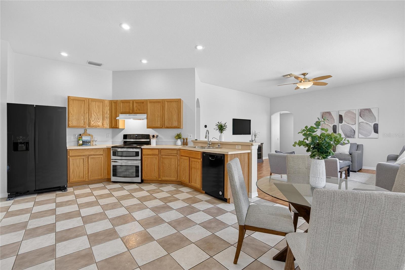 The kitchen is open to the family room