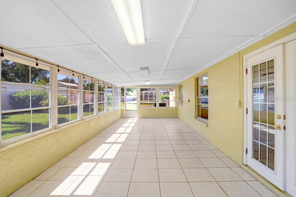 Enclosed lanai with view into family room