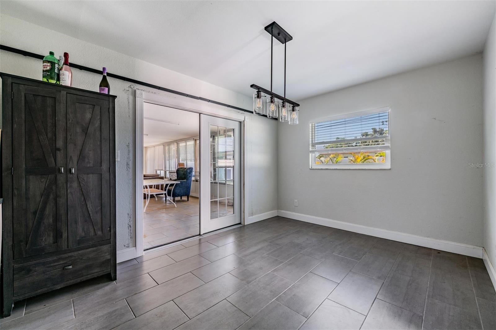 Dining area with French doors to Florida room