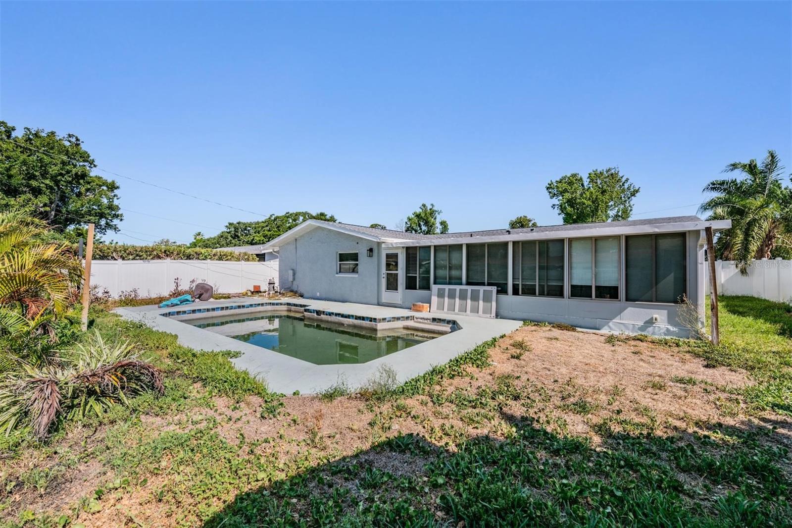 pool and fenced in back yard!