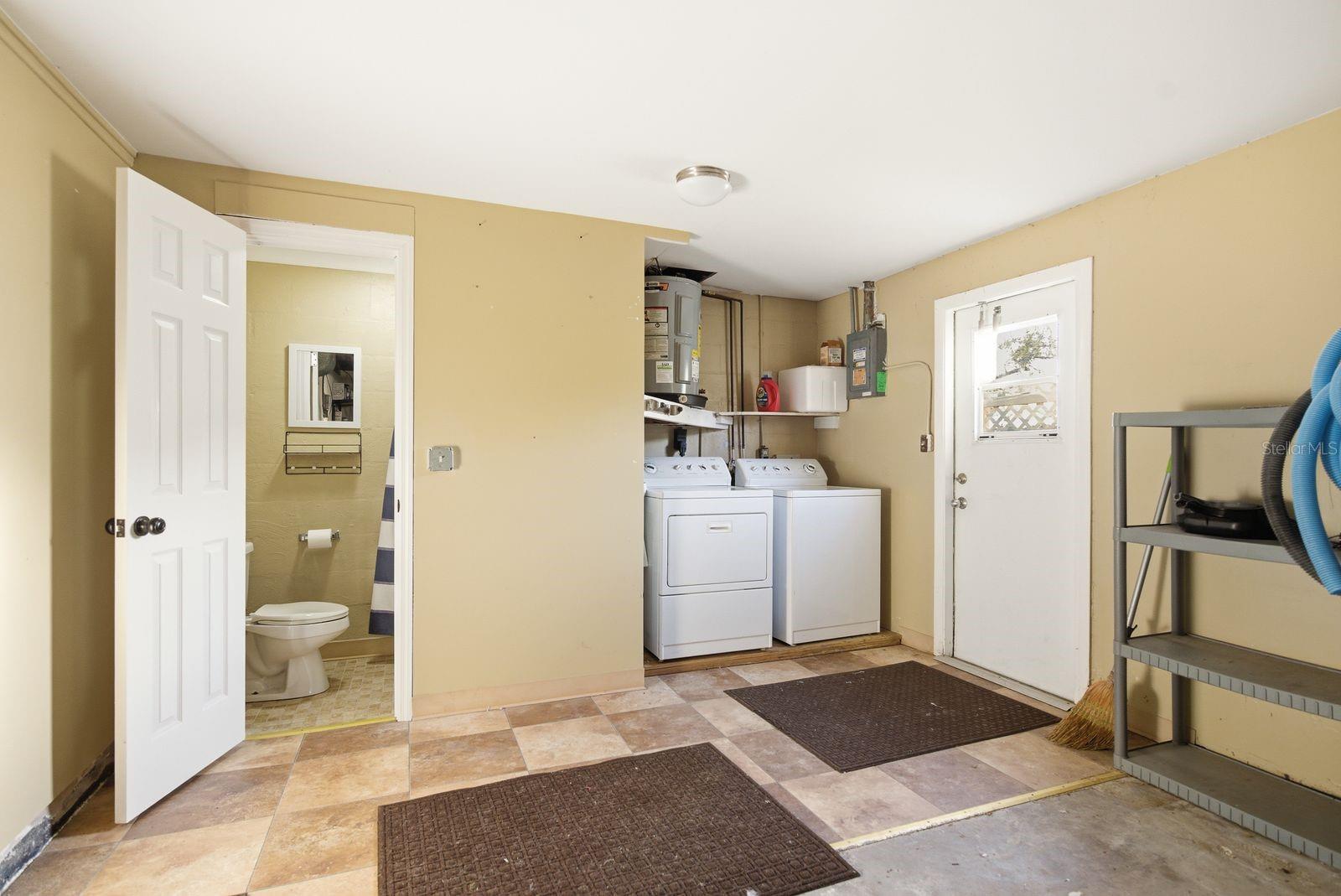Garage/ Half bath/ Washer and Dryer