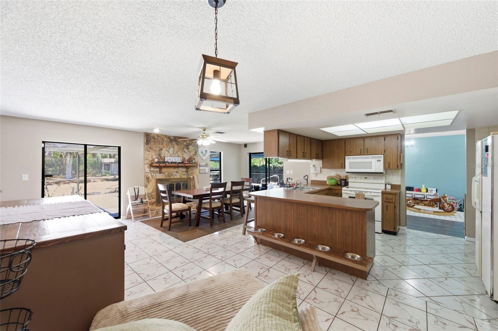 Family Room looking into Kitchen and Dining Room