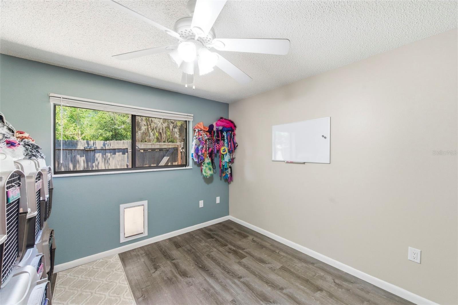 2nd Bedroom with doggy door.
