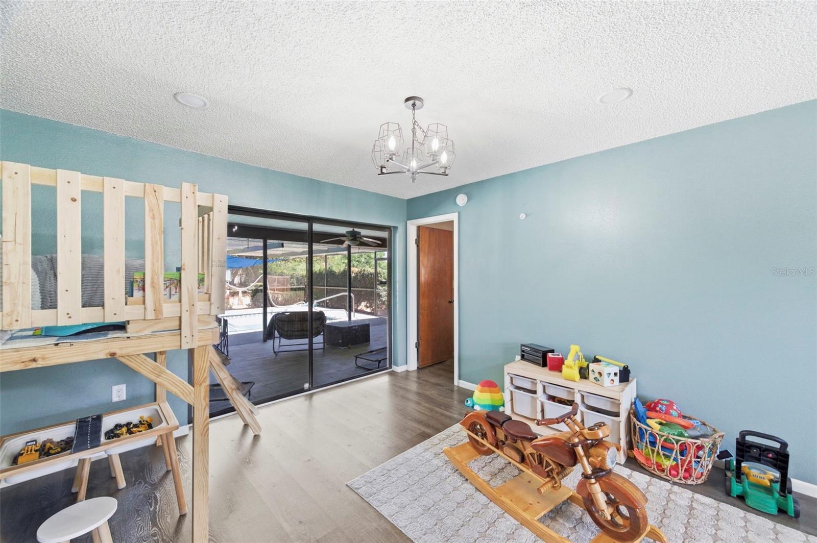 Bonus Area opens to back patio and screened pool area.