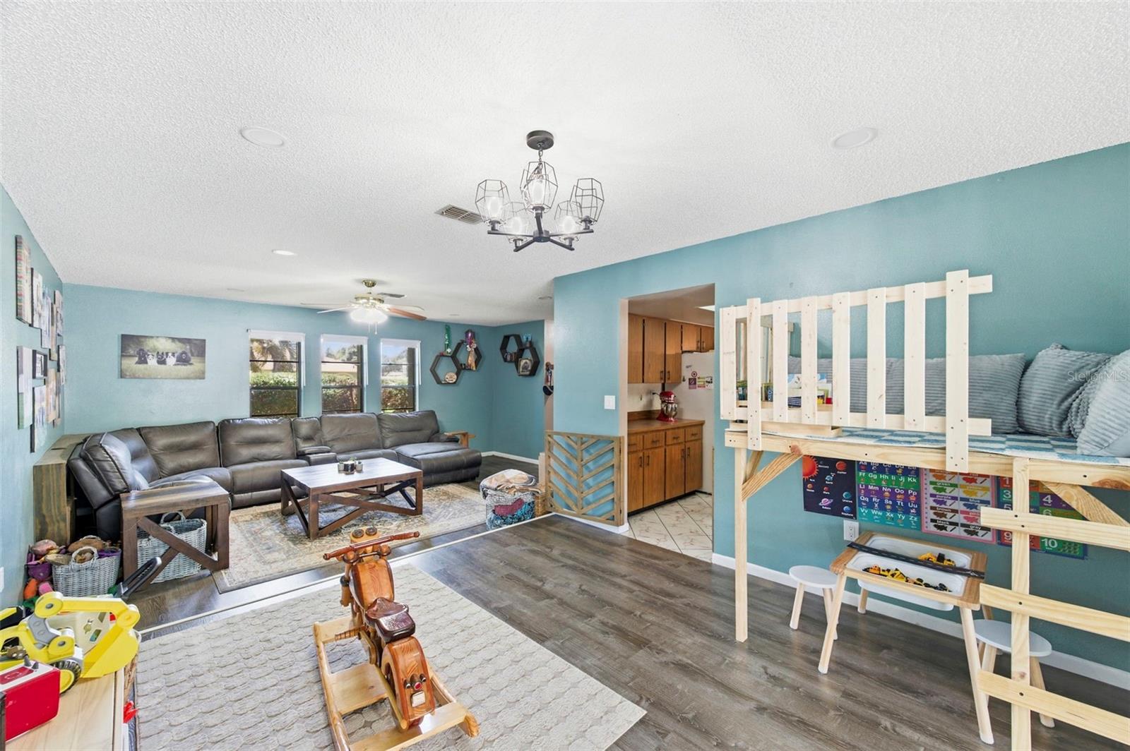 Looking toward the Living Room from the Bonus Area. Kitchen is to the right.