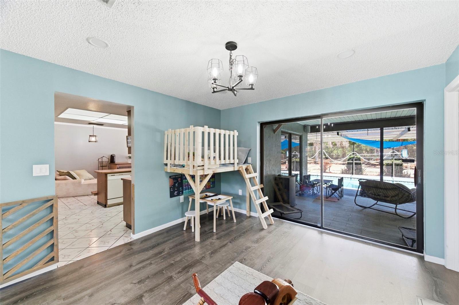 Custom made kid/pet safety gate between Bonus Area and Kitchen.