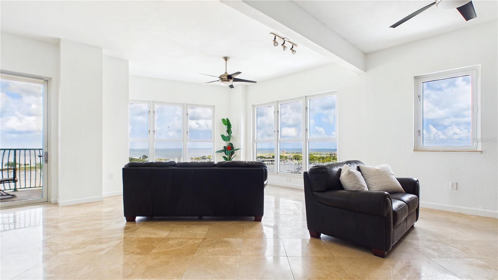 Living room and door to front balcony