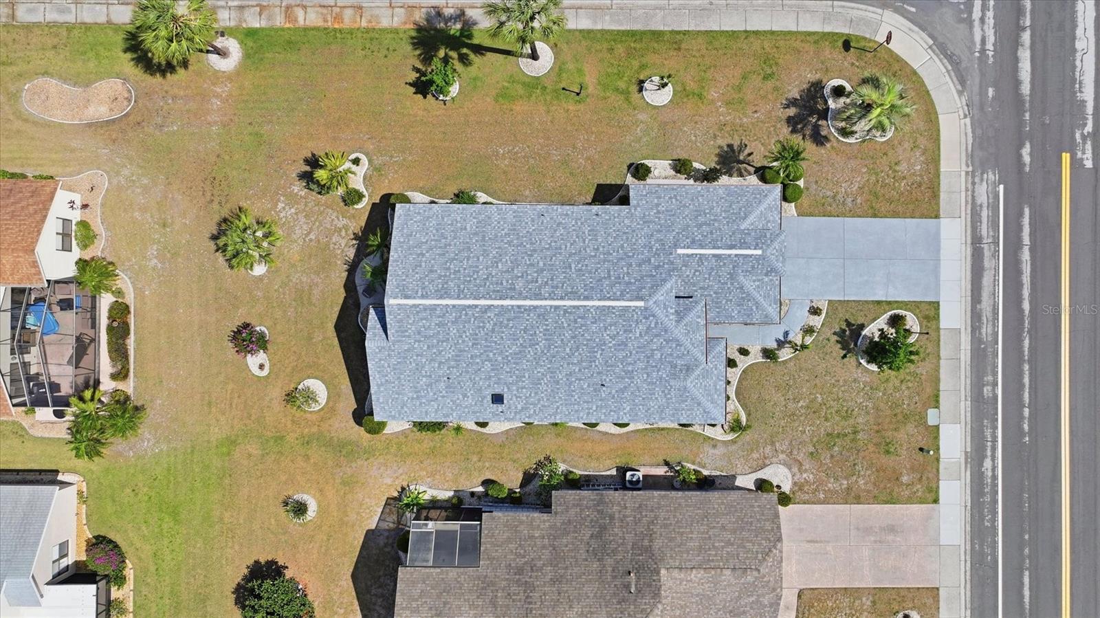 LARGE CORNER LOT NEW ROOF APRIL 2026 WITH FIRST TIME TRANSFERABLE WARRANTY