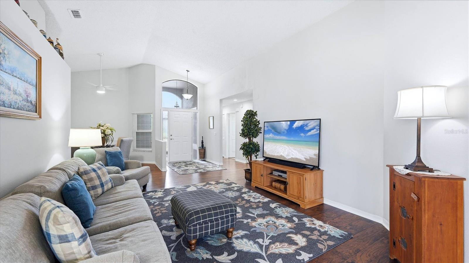 LIVING ROOM TO FOYER