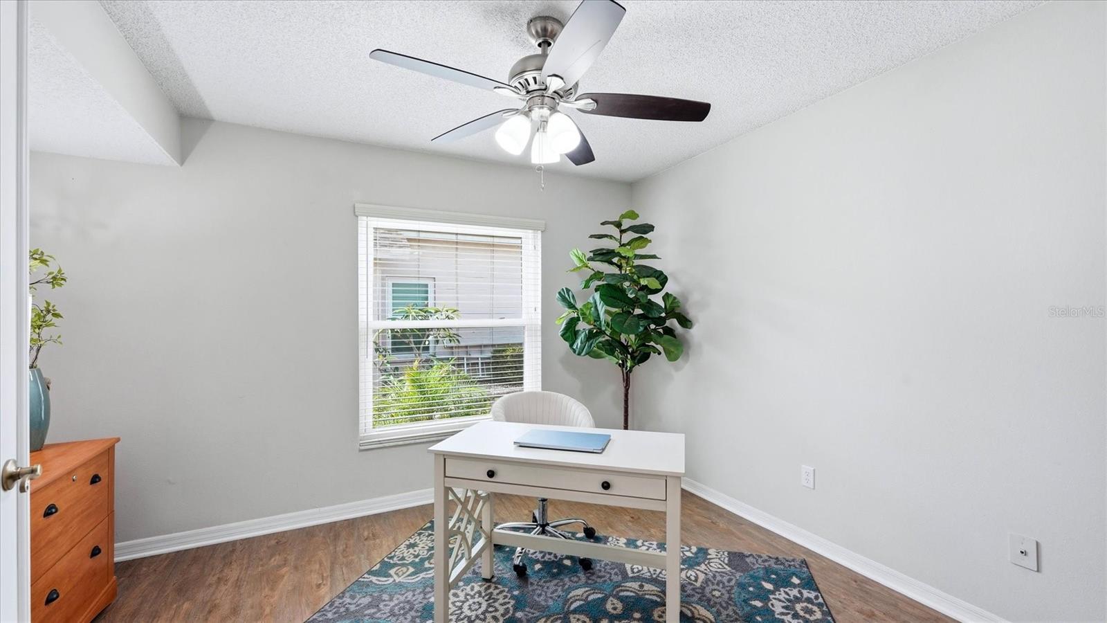 DEN OR POSSIBLE THIRD BEDROOM WITH THE ADDITION OF CLOSET DOORS