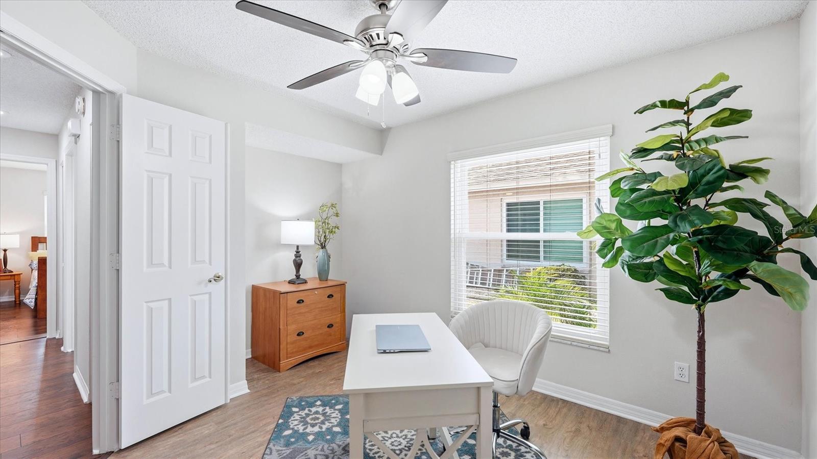 DEN OR POSSIBLE THIRD BEDROOM WITH THE ADDITION OF CLOSET DOORS