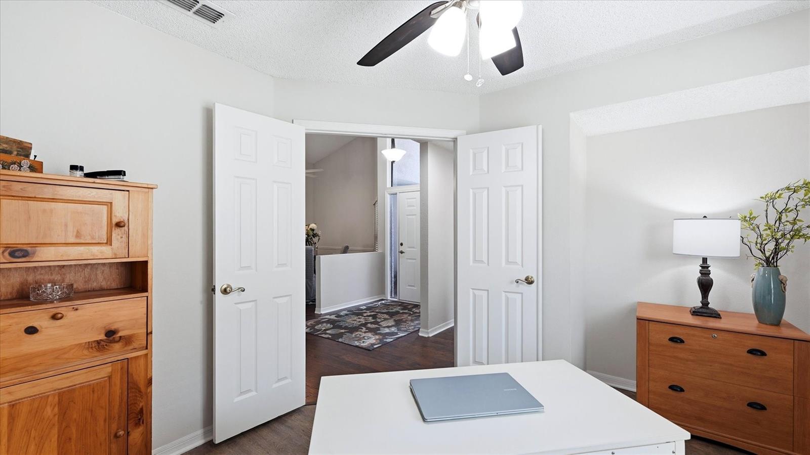 DEN OR POSSIBLE THIRD BEDROOM WITH THE ADDITION OF CLOSET DOORS