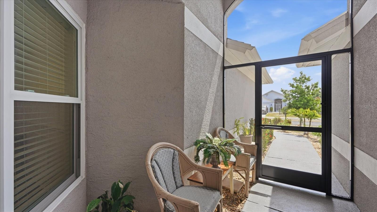 SCREENED FRONT LANAI INSTALLED DECEMBER 2021 WITH EAST SUNRISE VIEW