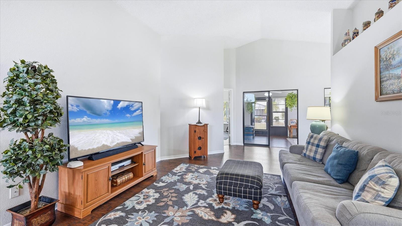 FROM THE FOYER LIVING ROOM TO FLORIDA ROOM