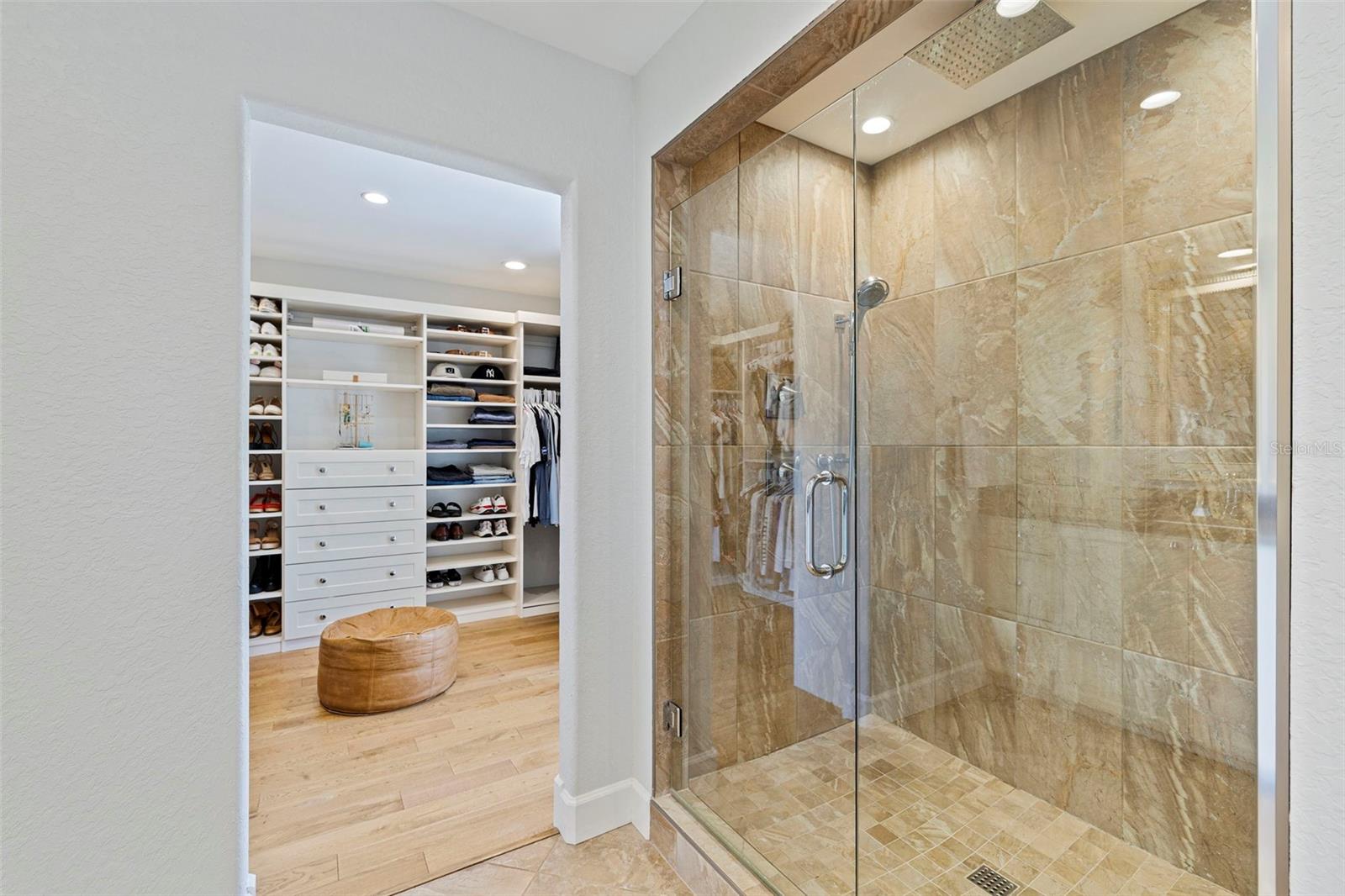 The Owner's bathroom has a large walk-in shower. When stepping out, you can easily step into the closet to get ready for the day or night.