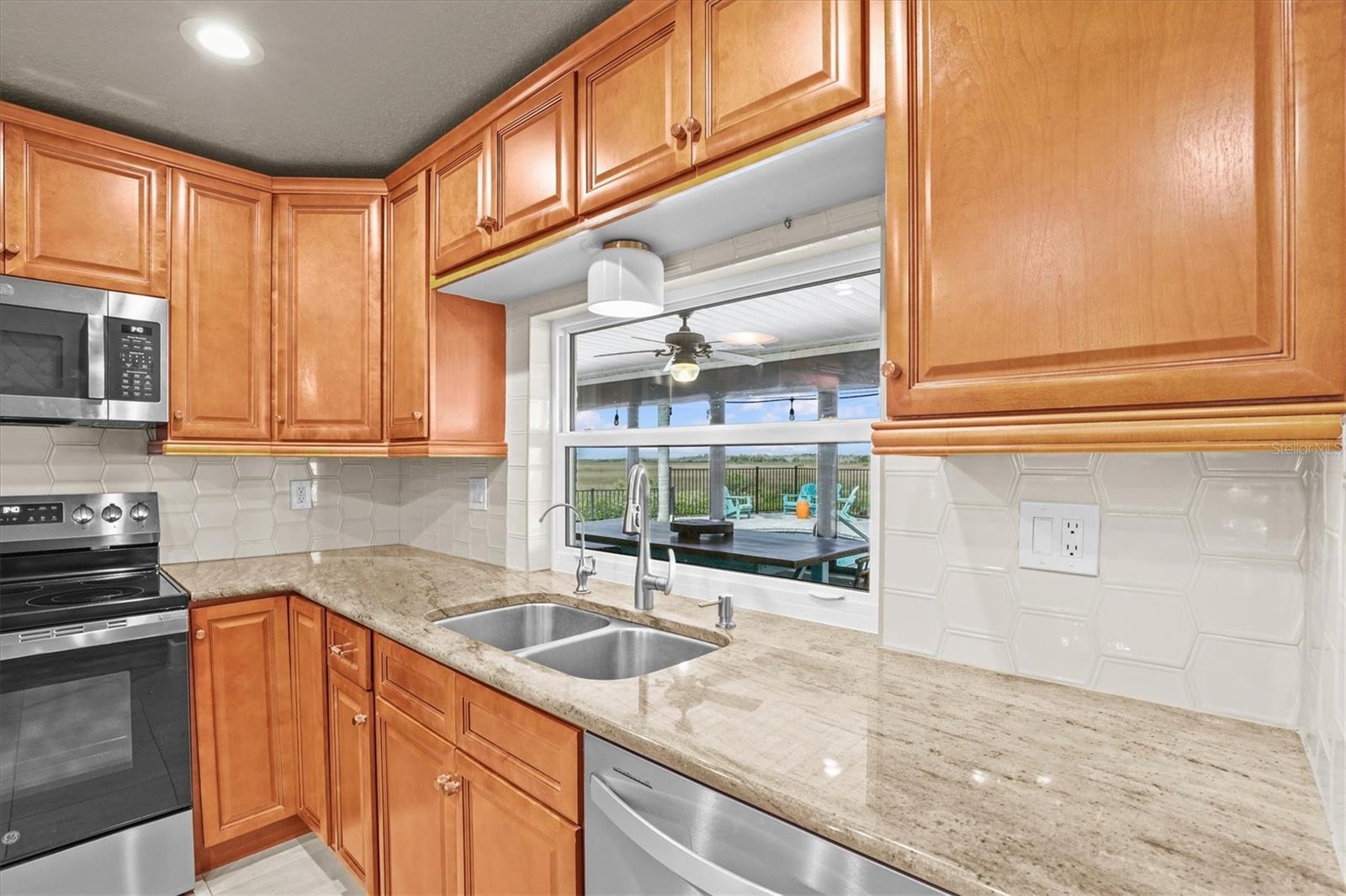 Kitchen Window with Views! Pretty Backsplash & Granite Counters