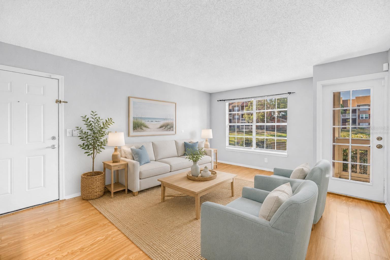 Bright and Spacious Living Overlooking Tranquil Pond - Virtually Staged