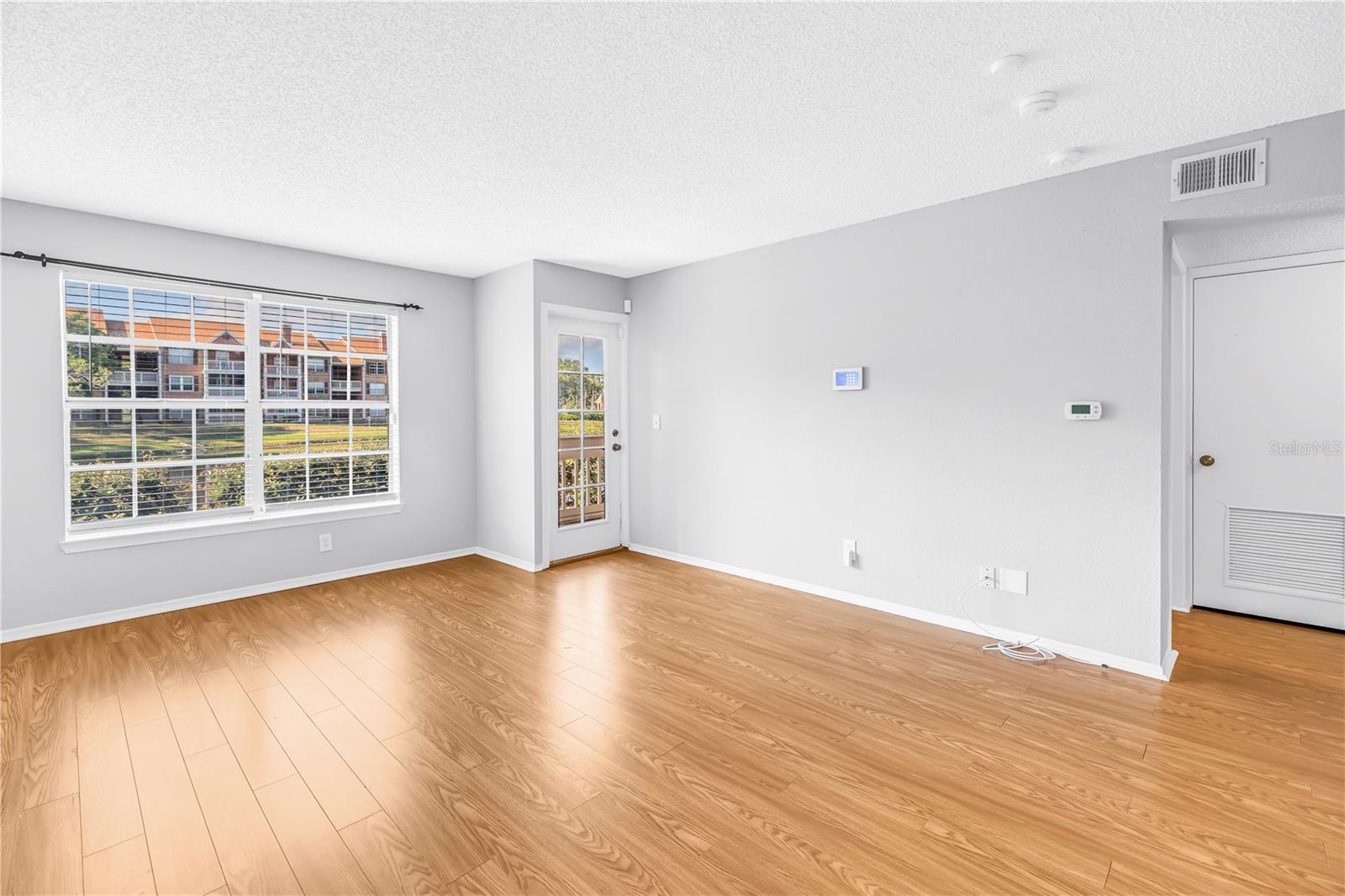 Living Room with Door to Screened Patio