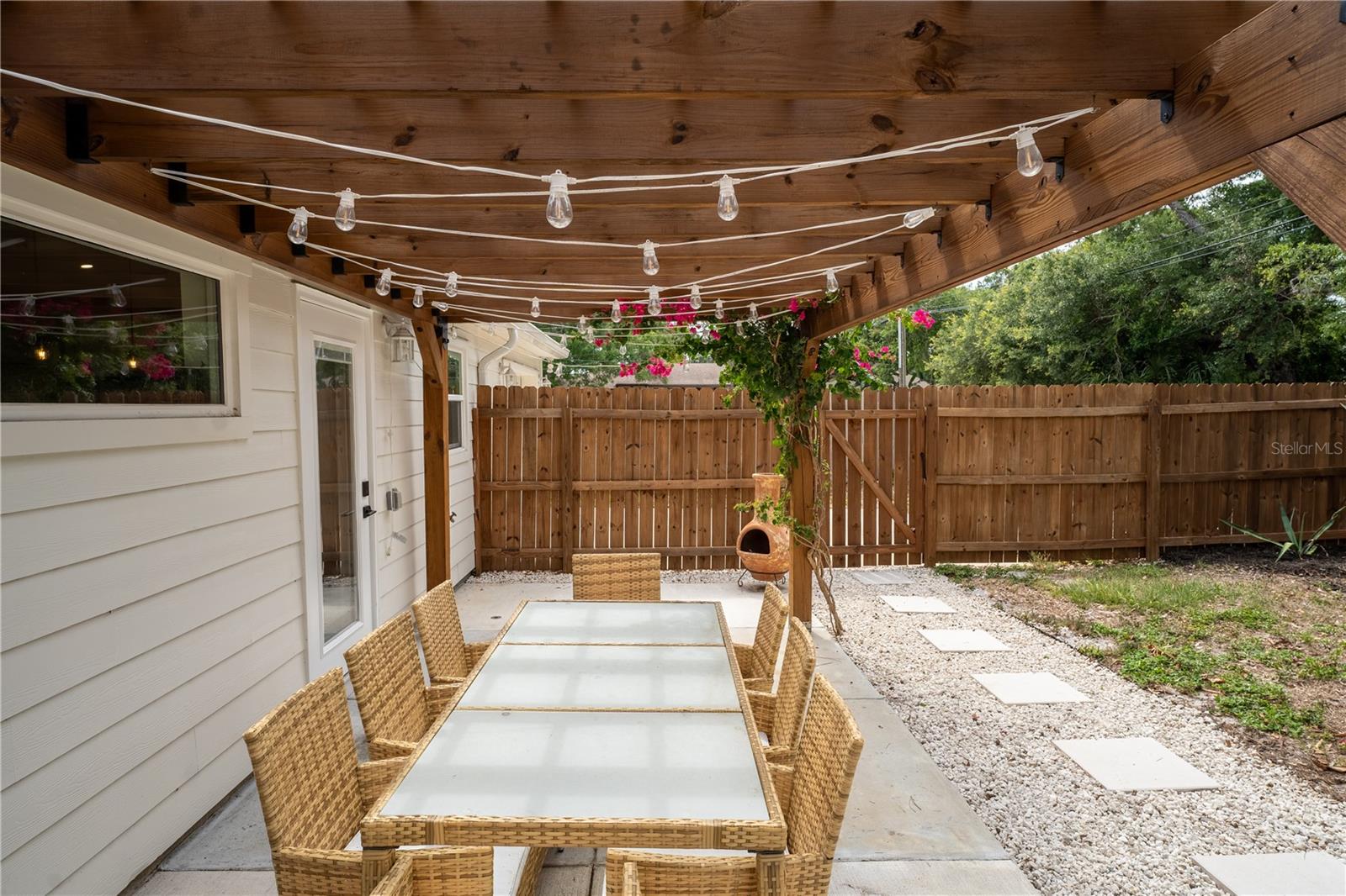 String lights on pergola in backyard