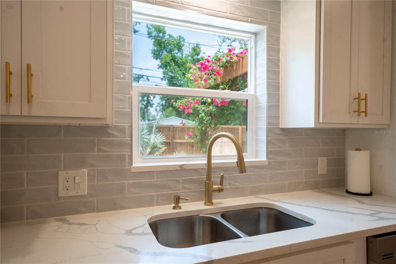 Gold hardware and faucets throughout home