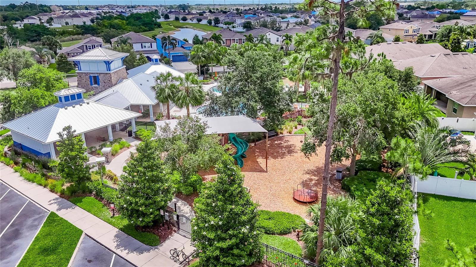 Community Center with pool, playground and cabana area