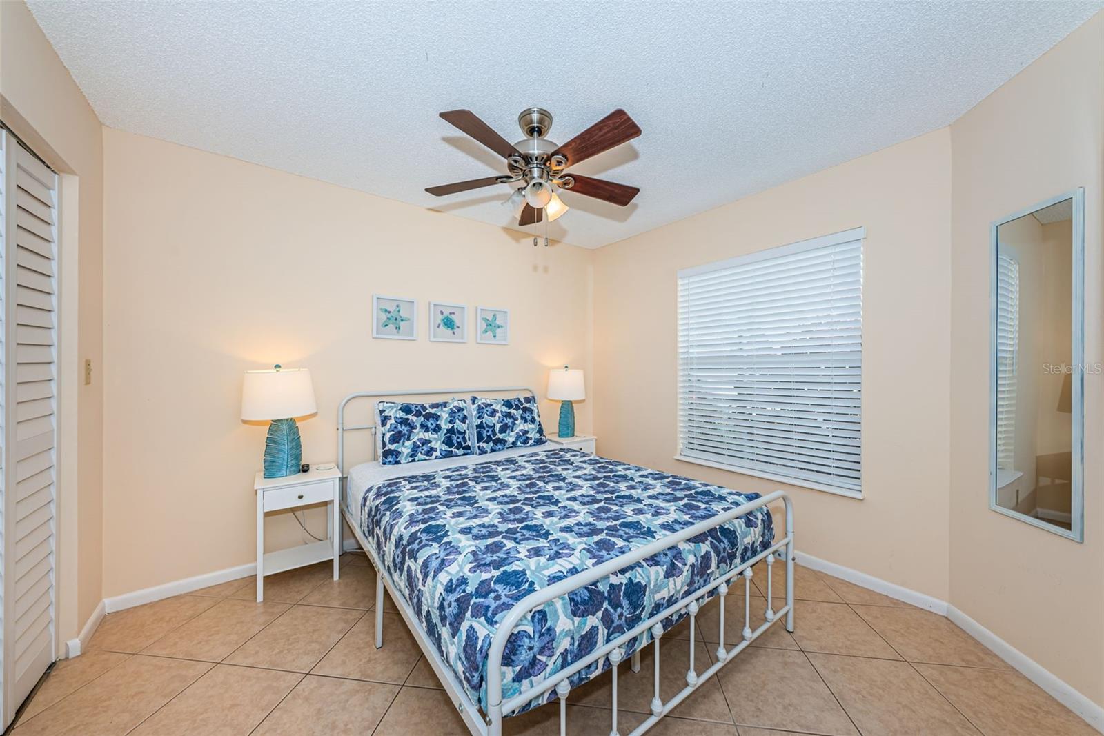 Second bedroom with walk-closet and access to the second bathroom