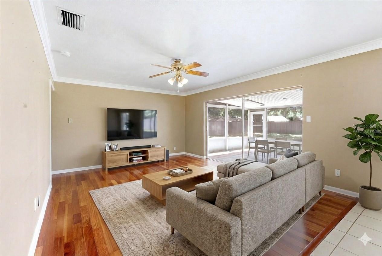 Plenty of room for a large sectional couch and more!  Hallway leads to 3 bedrooms, 2 bathrooms and offers a linen closet.