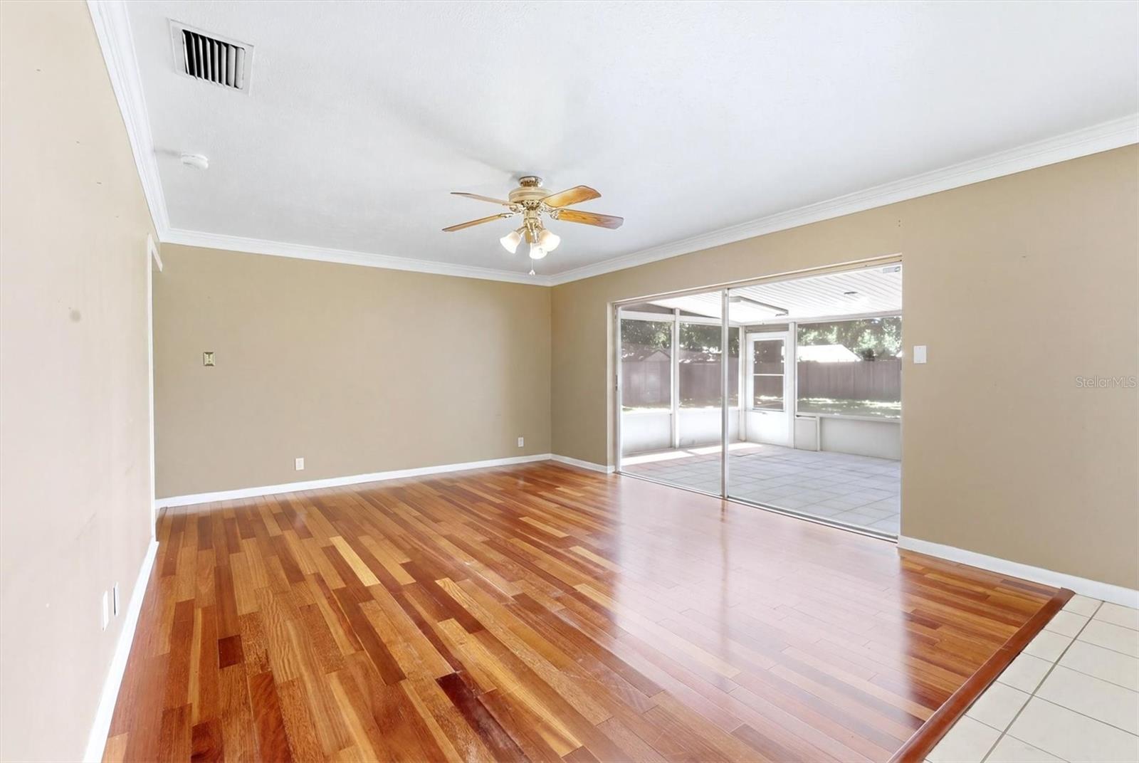 View from family room to kitchen and front entry