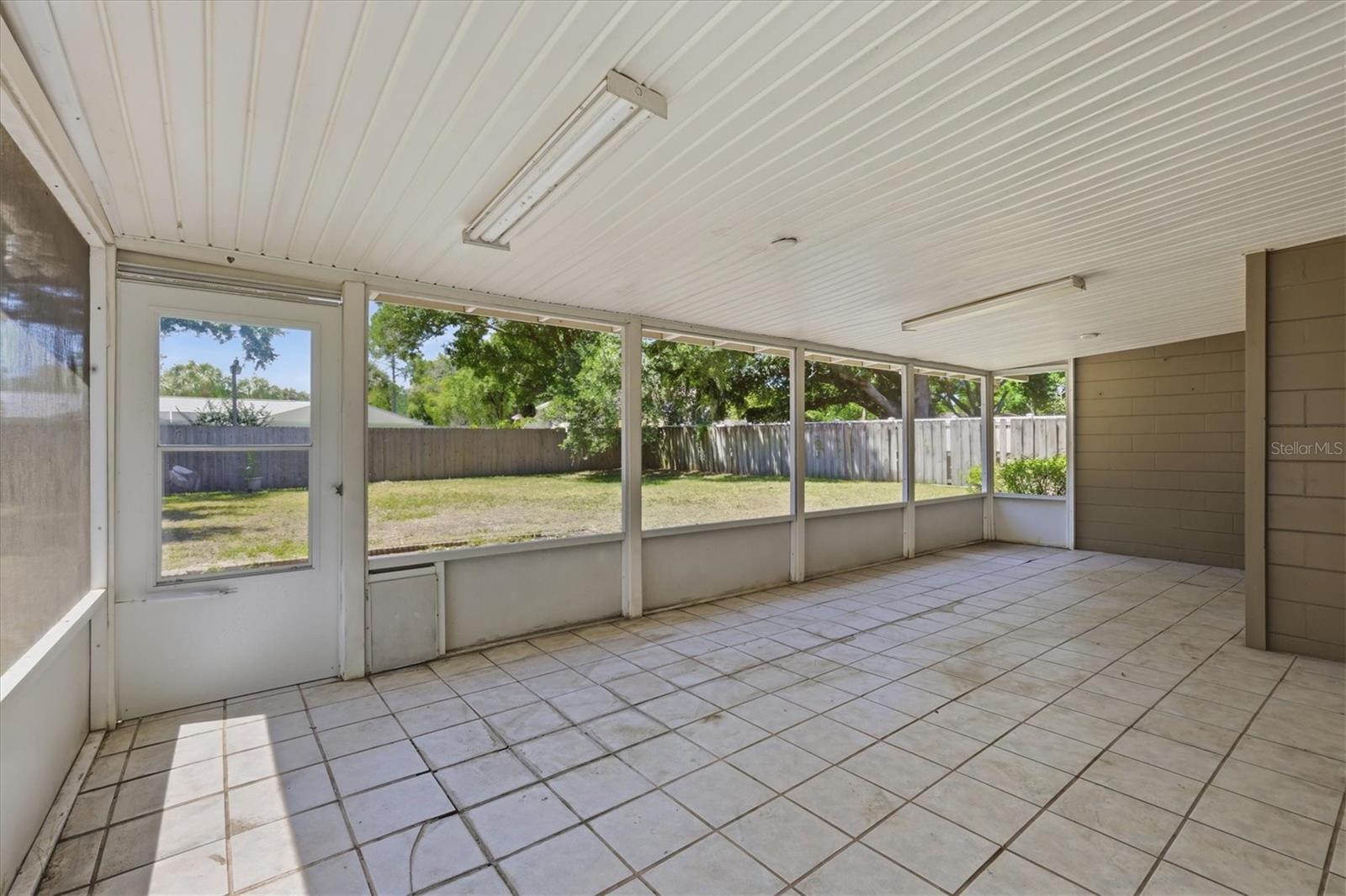 Virtually enhanced photo of a dream pool, spillover spa & large open deck